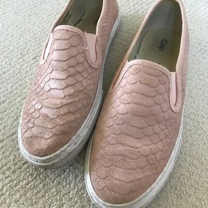 Pink slip on sneakers